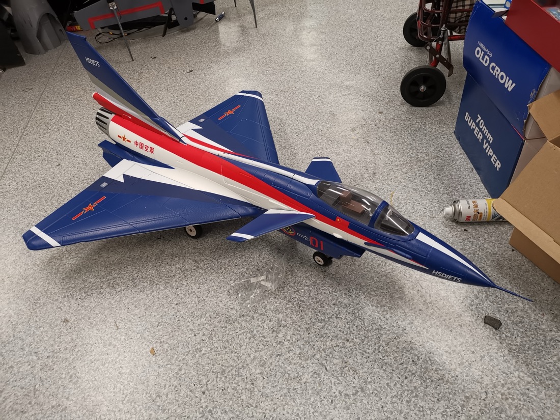 An RC J-10 jet in an aerobatic team livery